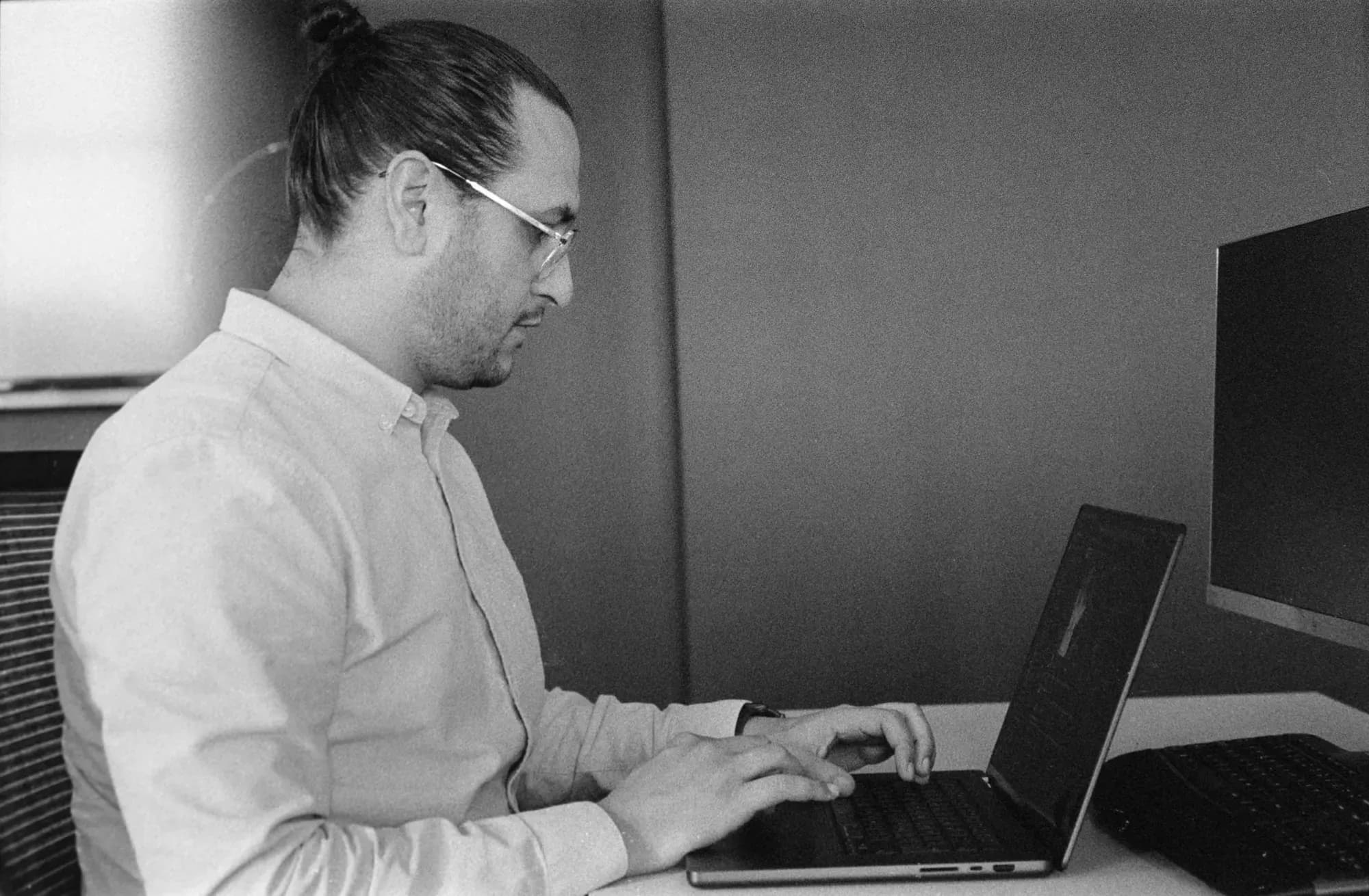 Colleague working on his laptop