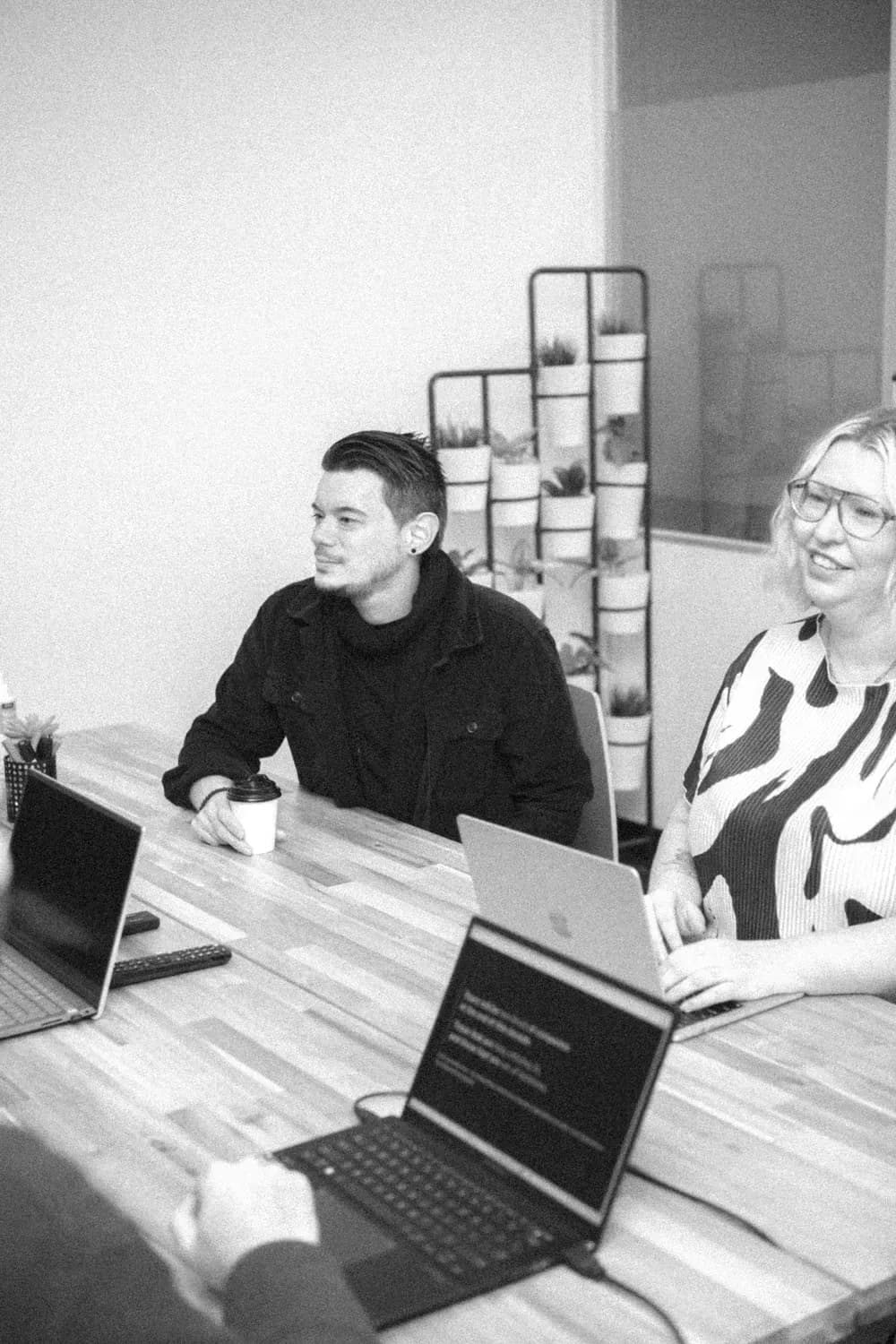 Two colleagues sitting at the table