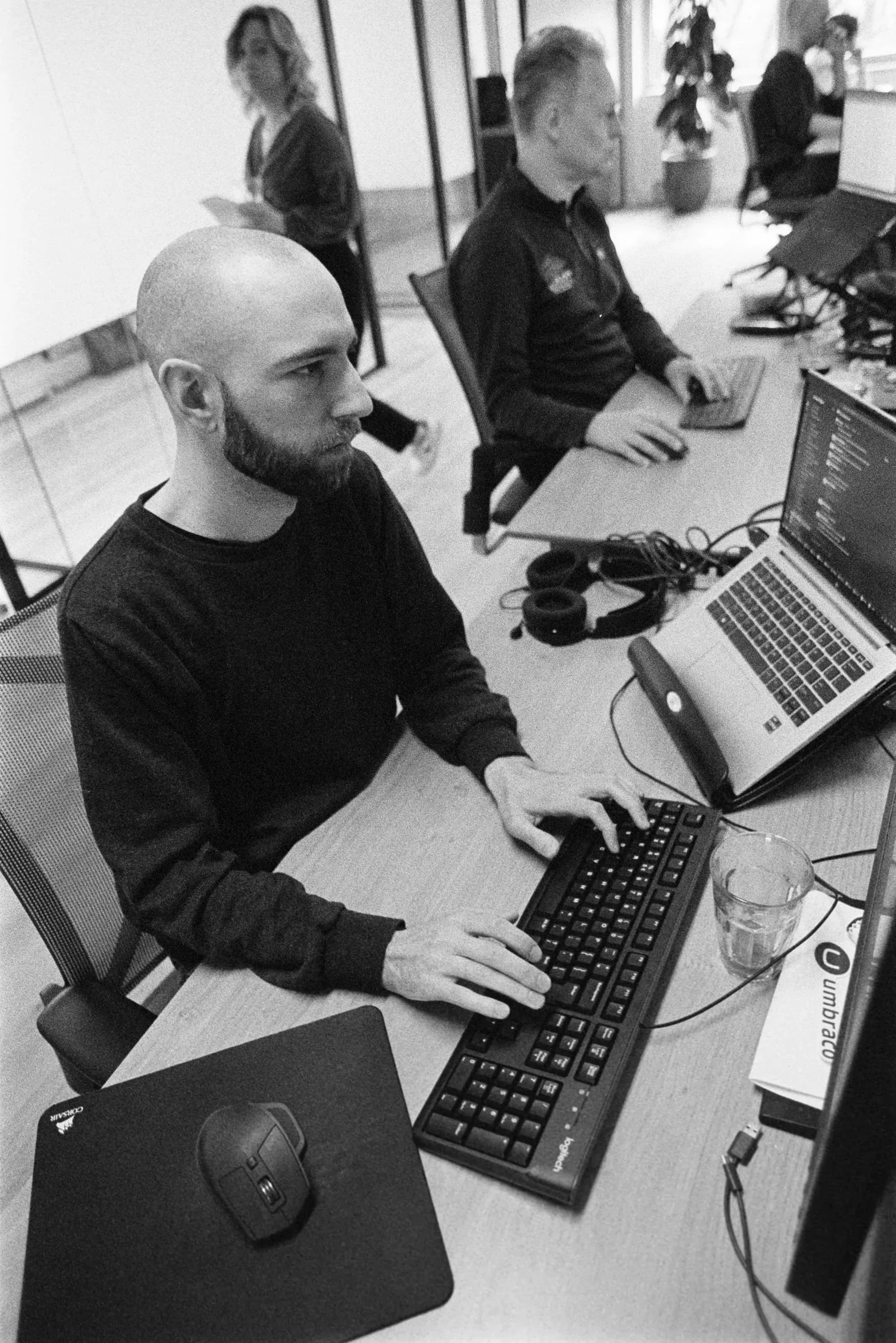 Colleague working behind computer