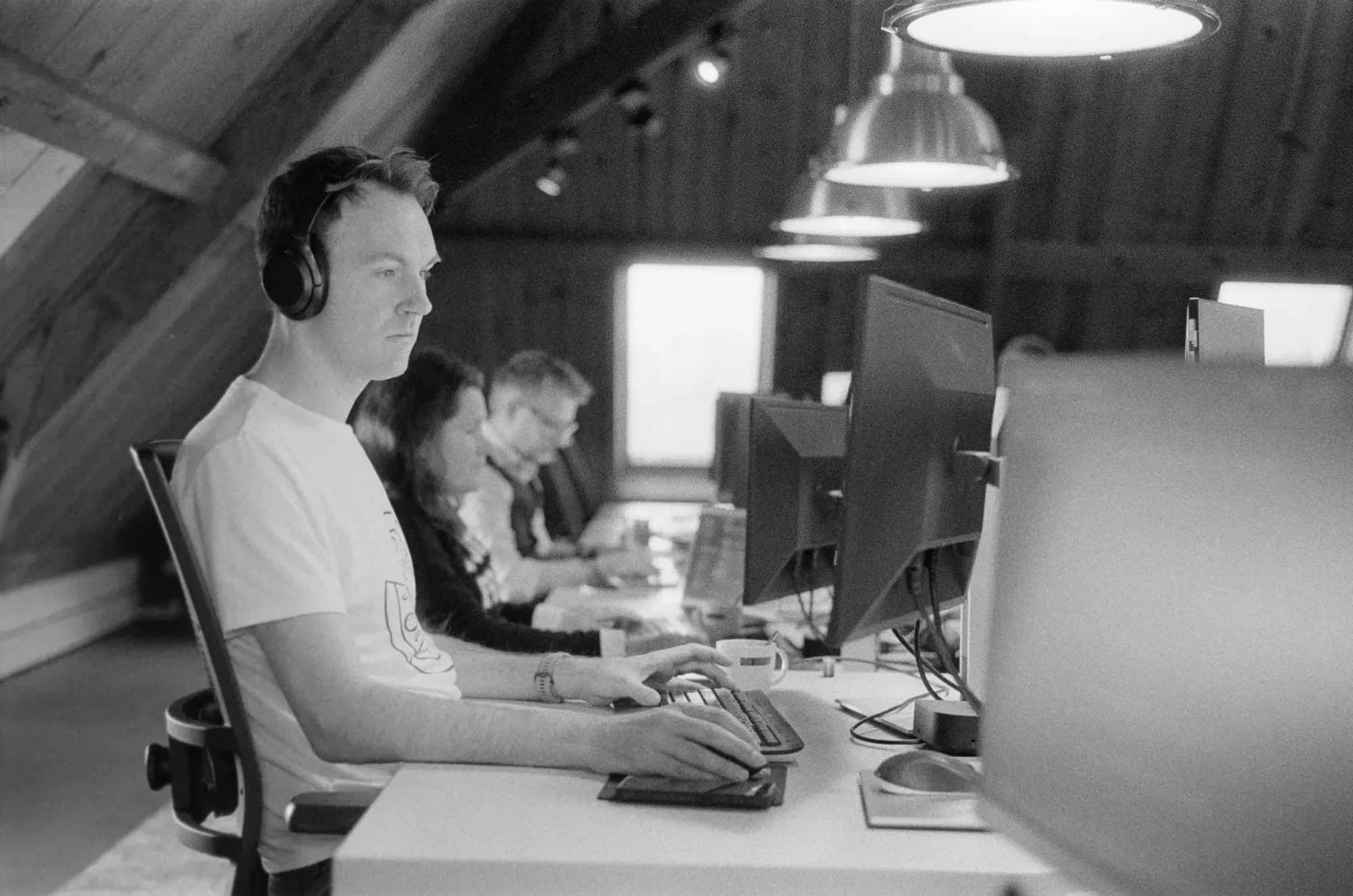 Colleague behind his computer